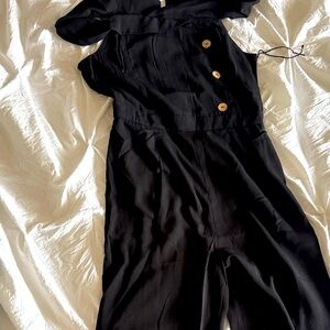 Elegant Black Jumpsuit with Button Detail Medium/large /No returns never worn